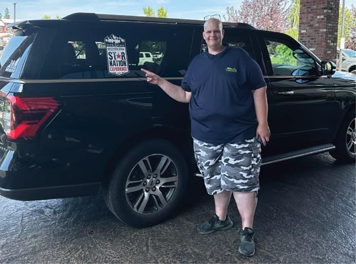 Portrait of Shawn Van with Western Star truck